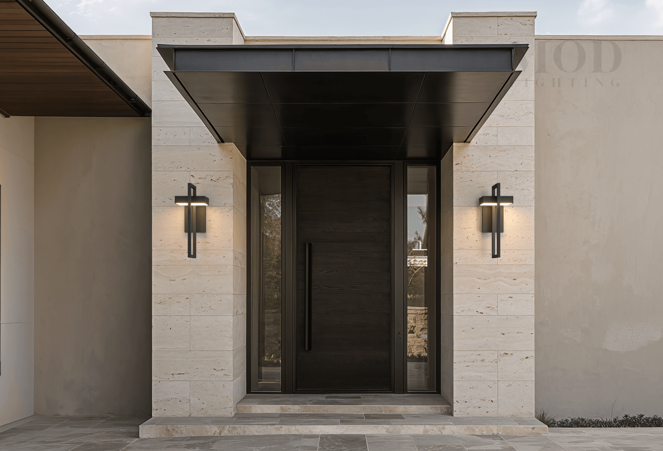 Terri modern outdoor lantern sconce beside a front door