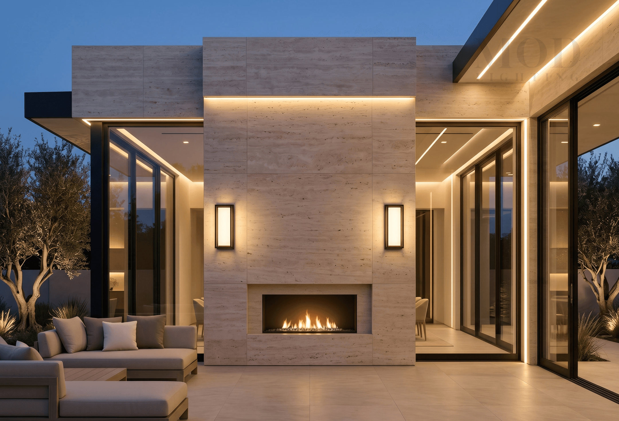 patio corner with warm lantern sconce and intimate lighting